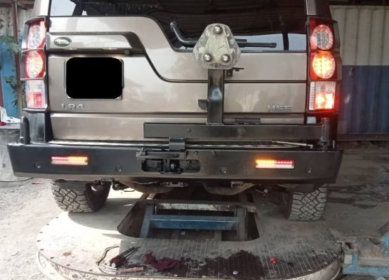 Rear Tire Carrier Refurb Reinstall.jpg
